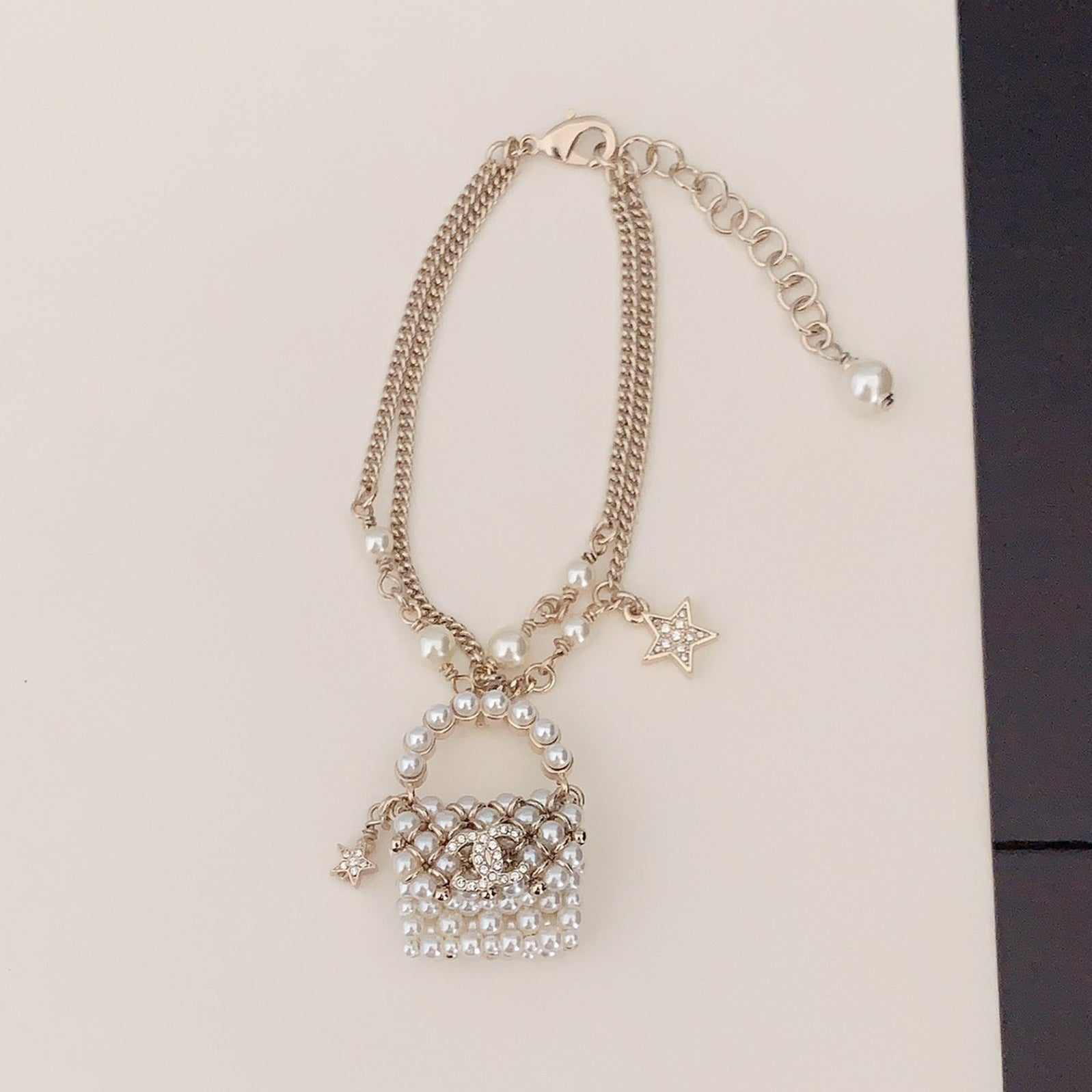 18K CC Bag Pendant Pearl Bracelet