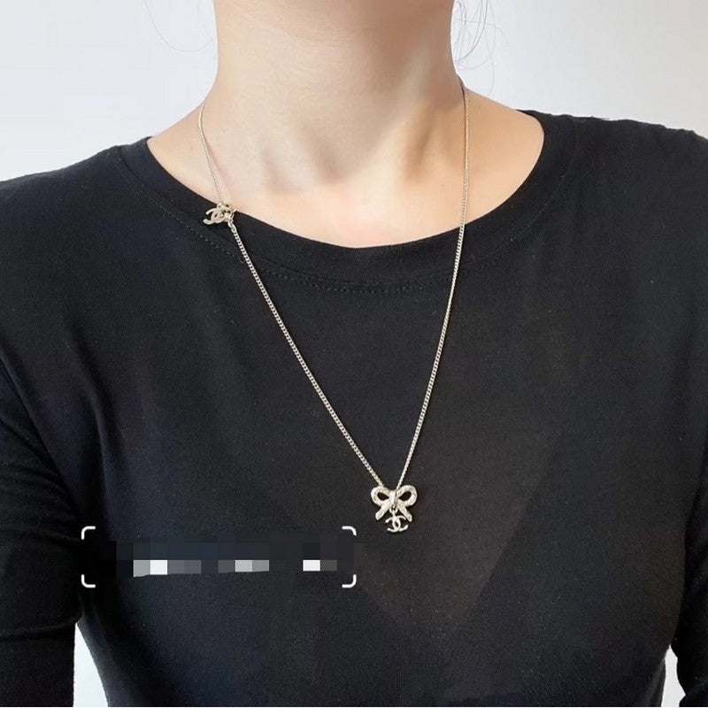 18K CC Gold Bow Tie Necklace